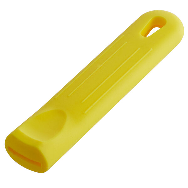 A yellow removable silicone sleeve with a hole for a pan handle.