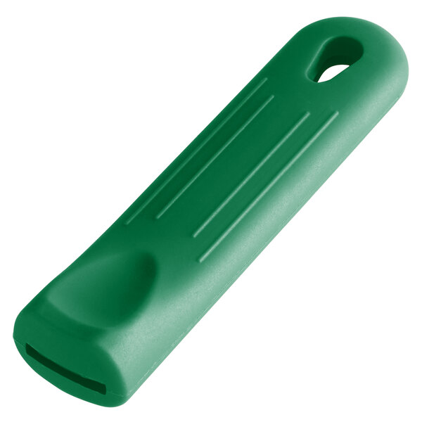 A green removable silicone pan handle sleeve with a hole in it.