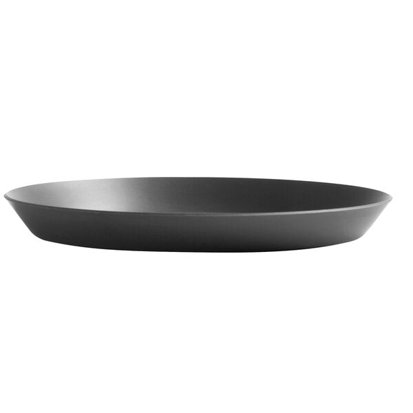 A black Vollrath hard coat aluminum pizza pan.