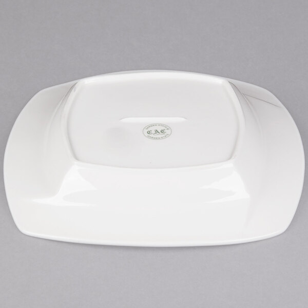 A white square porcelain pasta bowl with a logo on it.