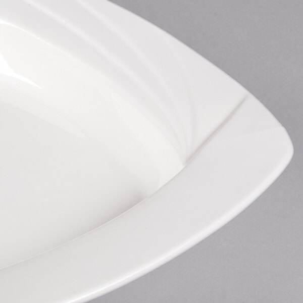 A CAC white square porcelain pasta bowl with a curved edge.