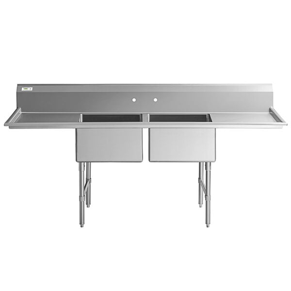 A Regency stainless steel 2 compartment sink with drainboards on a counter.