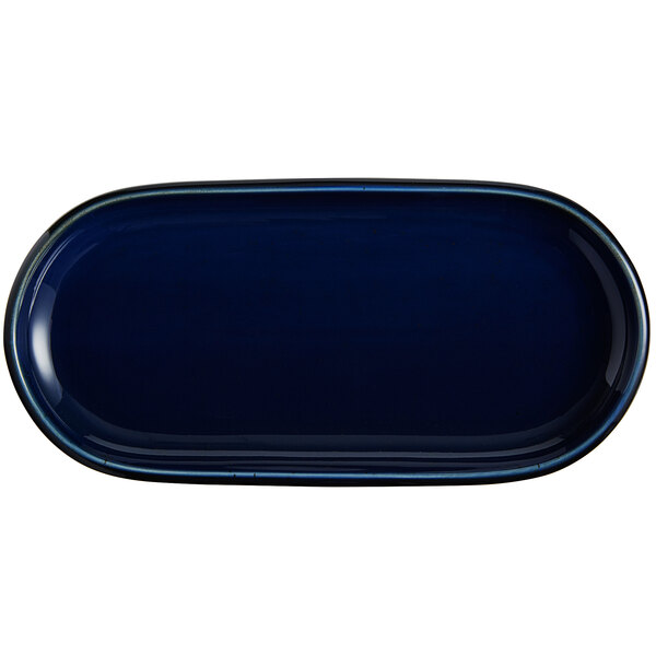 An Acopa Azora blue stoneware oblong coupe platter with a black rim.