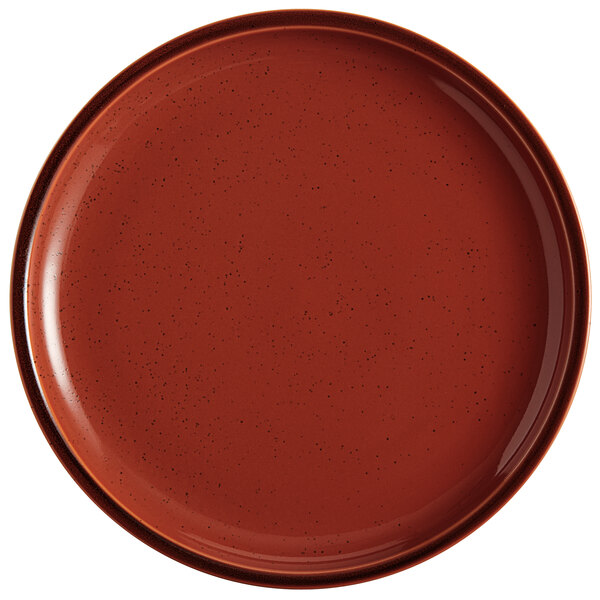 A brown Acopa Keystone stoneware coupe plate with specks.