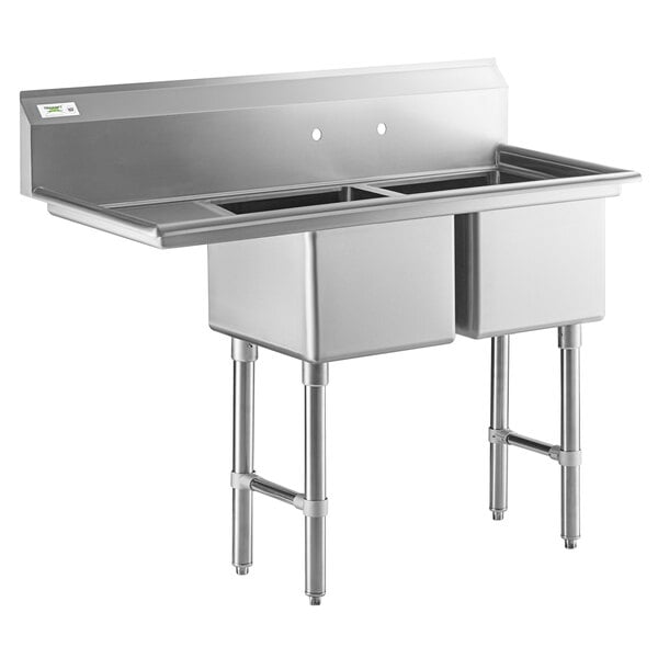 A Regency stainless steel sink with two compartments and a drainboard.