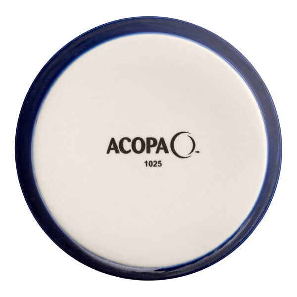A small round blue and white porcelain ramekin with the brand name 'Acopa' on the bottom.