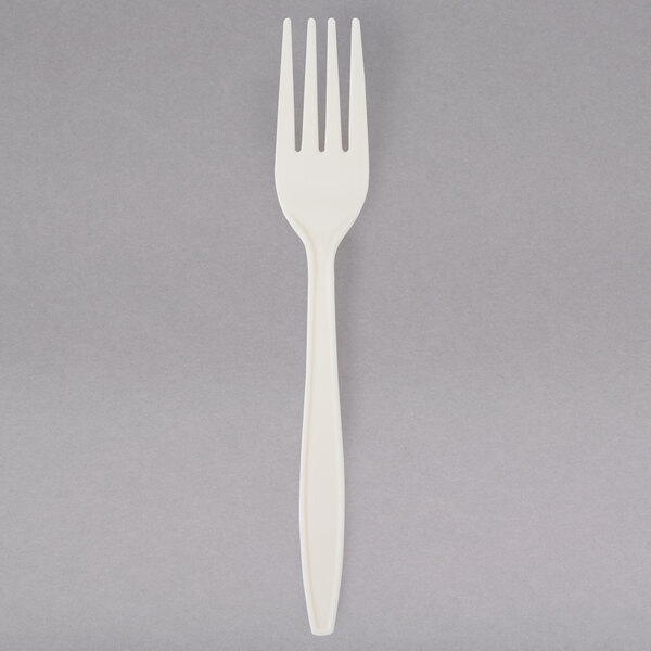 A 7 1/8" cornstarch fork with a white plastic handle.