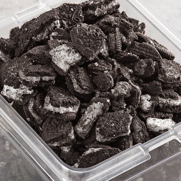 Crushed Oreo cookie pieces in a container