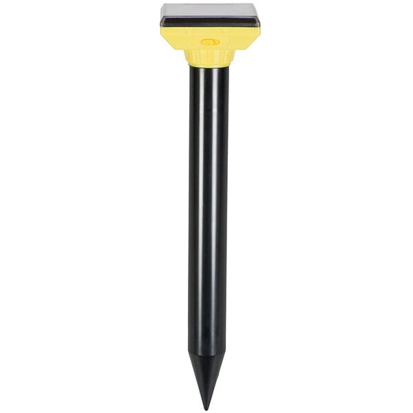 A black and yellow plastic spike with a yellow cap.