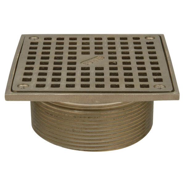 A Zurn polished nickel bronze square drain grate with square openings.