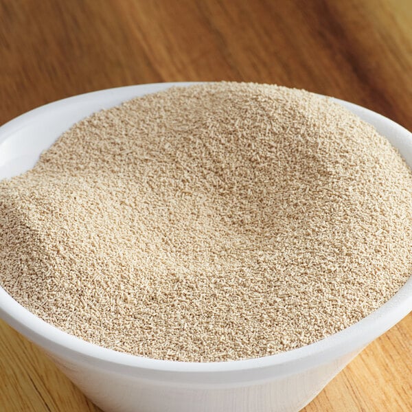 A bowl of Lesaffre SAF-Instant red dry yeast.
