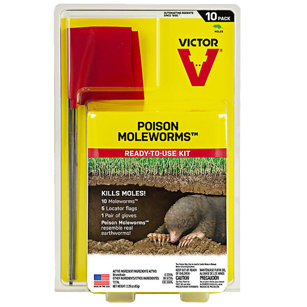 A yellow and red package of Victor Poison Moleworms with a mole trap on the front.