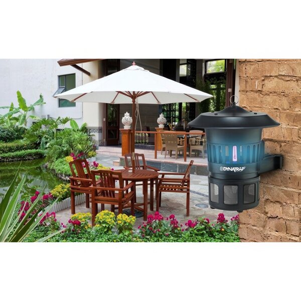 A Dynatrap insect trap on a patio table.