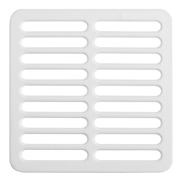 A white rectangular Zurn floor sink grate with rectangular holes.