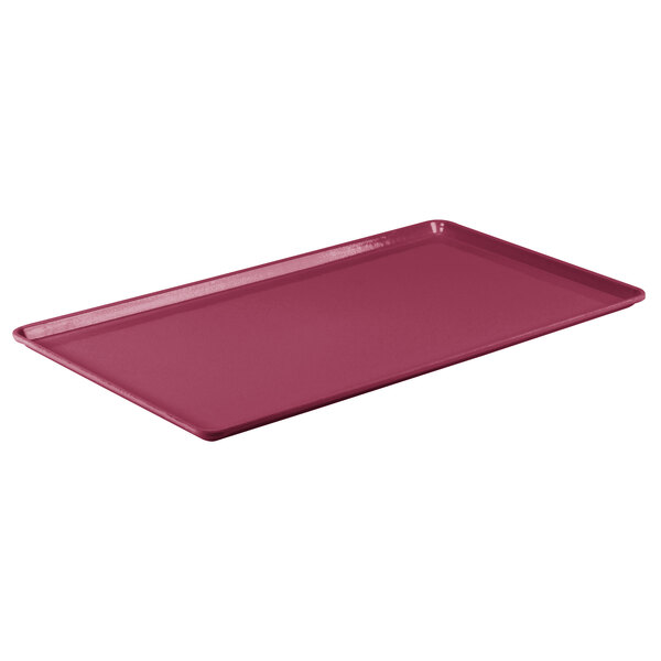A red Cambro rectangular dietary tray with a plastic handle.