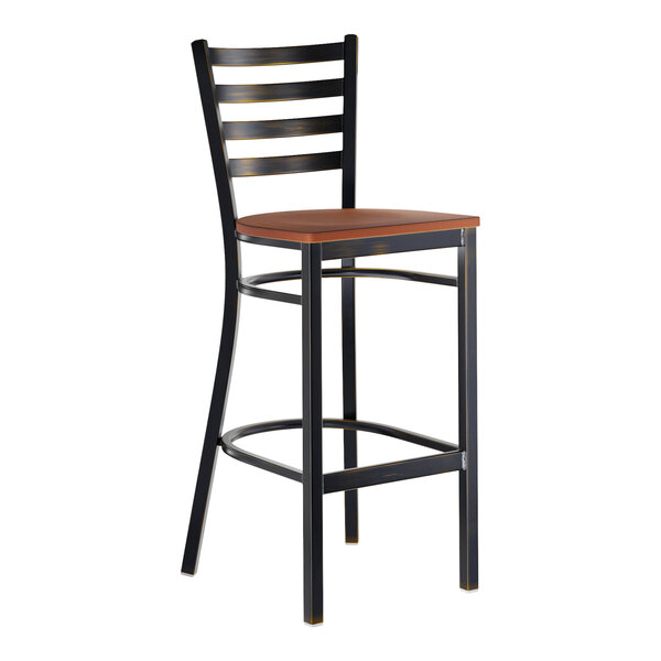 A metal ladder back bar stool with a distressed copper finish and an antique walnut wood seat.