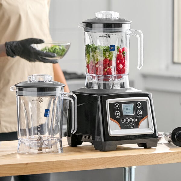 A commercial blender with touchpad controls, timer, adjustable speed, and two 48 oz. Tritan containers.