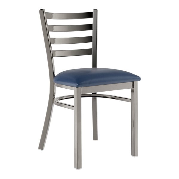 A Lancaster Table & Seating metal ladder back chair with a navy vinyl padded seat.