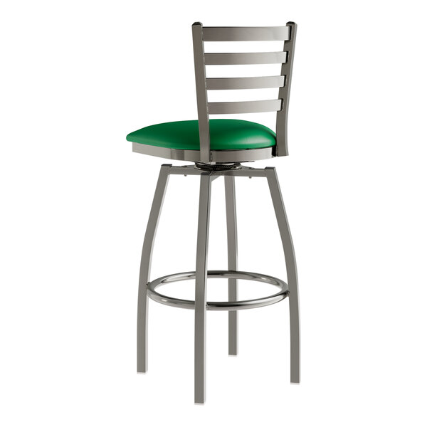 A green vinyl padded Lancaster Table & Seating swivel bar stool with metal legs.