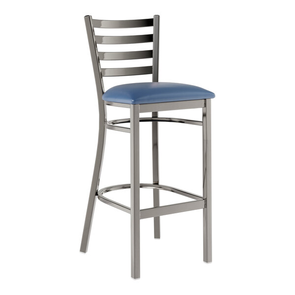 A metal bar stool with a ladder back design and a navy blue vinyl padded seat.