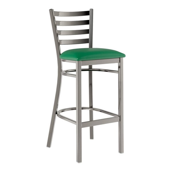 A Lancaster Table & Seating clear coat finish ladder back bar stool with a green vinyl padded seat on metal legs.