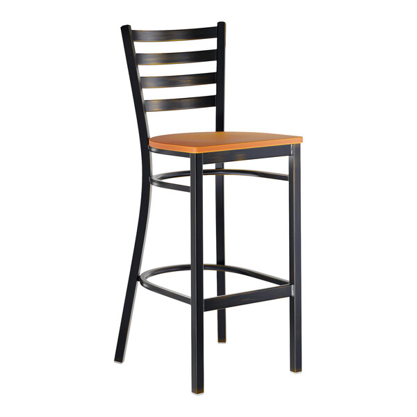 A metal ladder back bar stool with a distressed copper finish and a cherry wood seat.