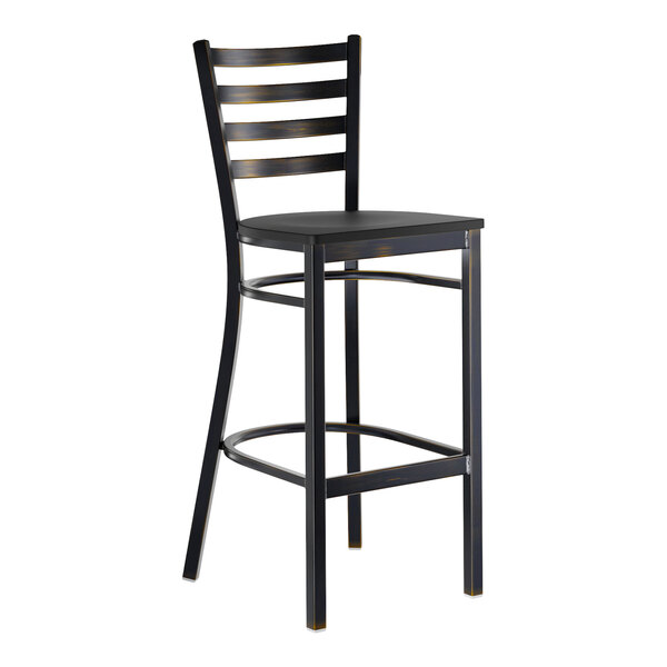 A black metal ladder back bar stool with a distressed copper finish and a black wood seat.