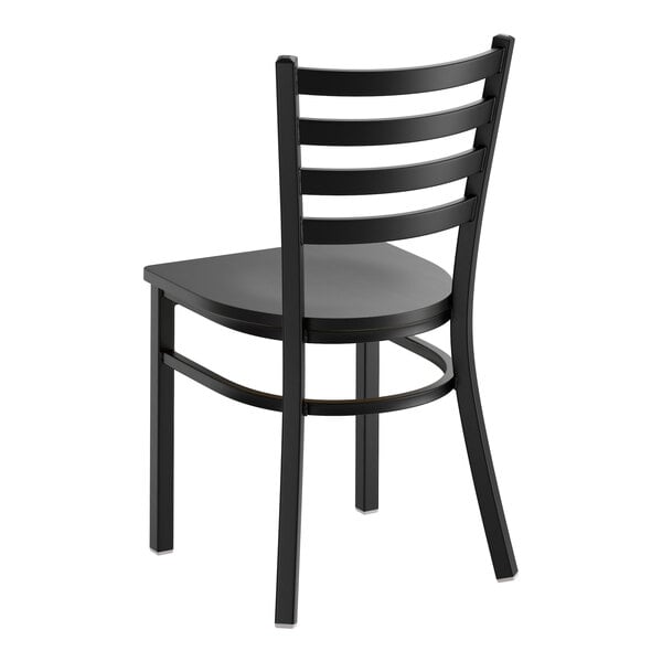 A black ladder back chair with a black wood seat and a detached seat design.