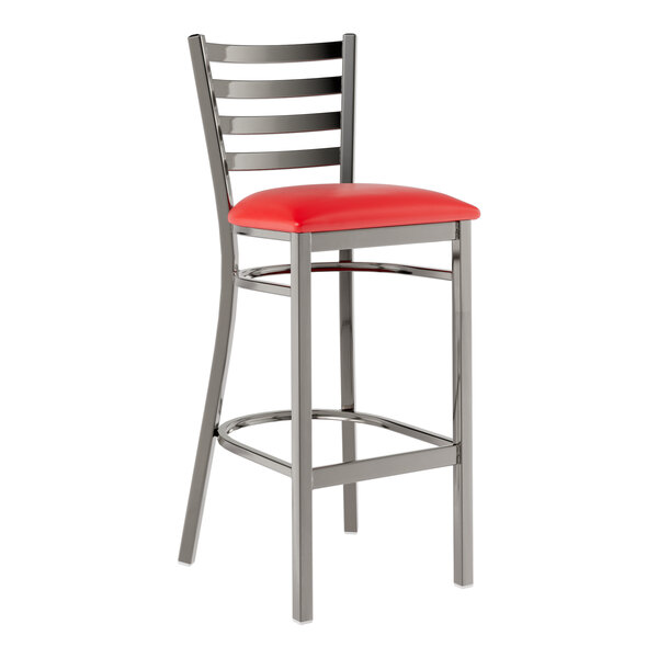 A Lancaster Table & Seating clear coat finish metal ladder back bar stool with a red vinyl padded seat.