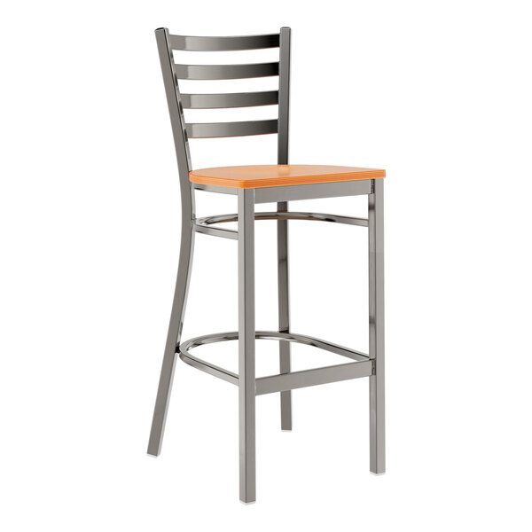 A metal bar stool with a ladder back design and a cherry wood seat.