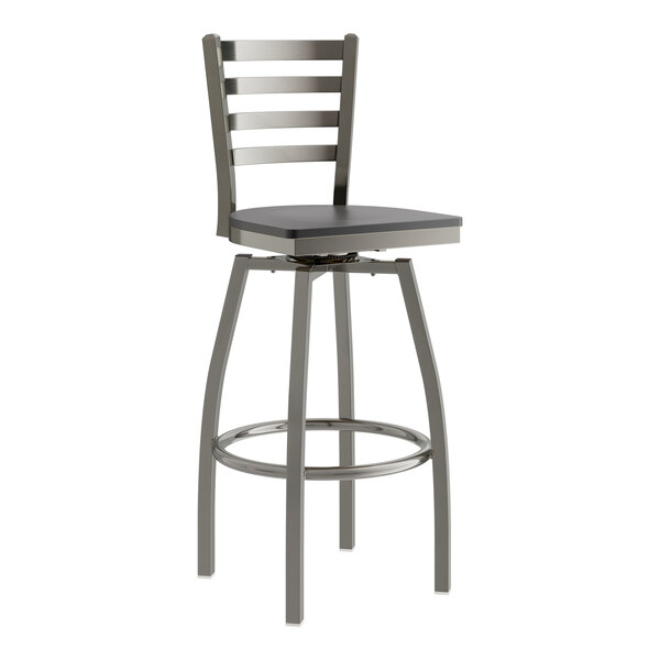 A Lancaster Table & Seating metal bar stool with a black wood seat.