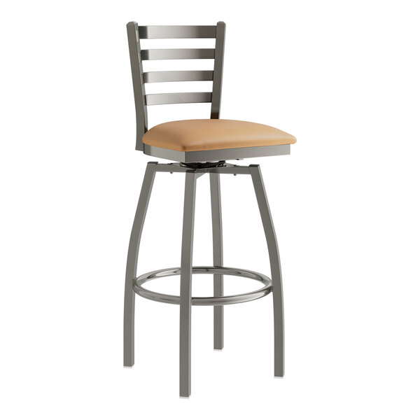 A Lancaster Table & Seating swivel bar stool with light brown vinyl padding on the seat and back.