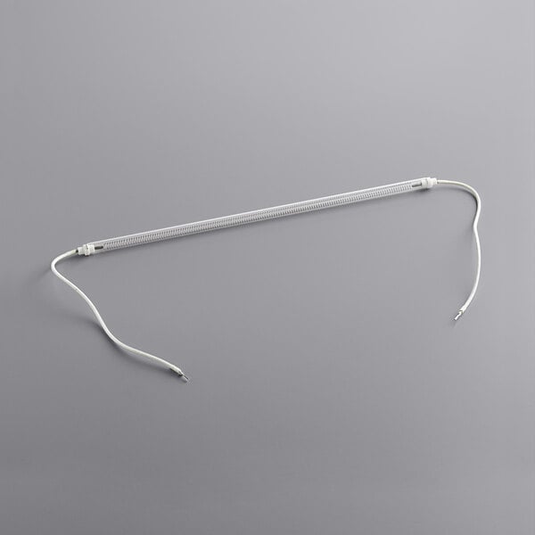 A white heating element with a wire attached.