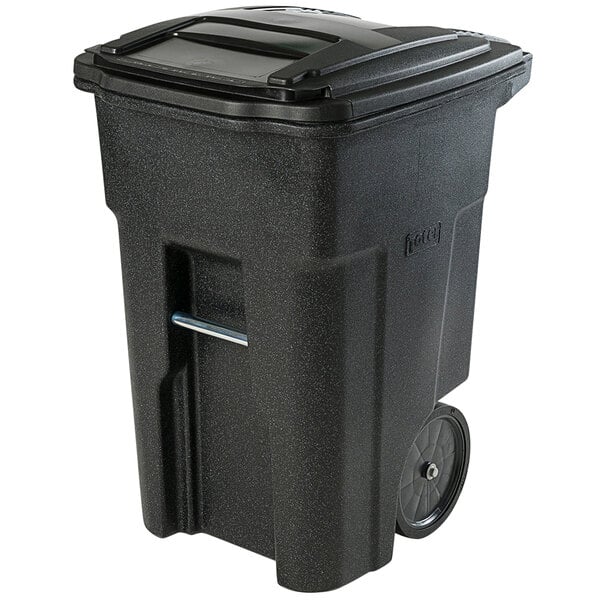 A black Toter rectangular trash can with wheels.