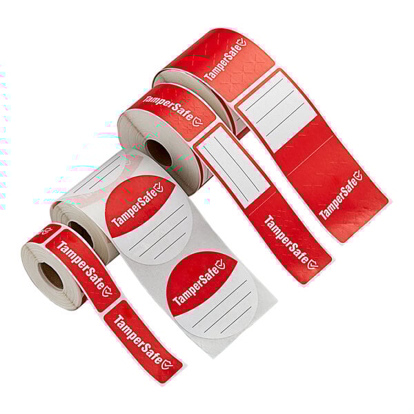 A group of TamperSafe red and white rolls of labels with white text on a white background.