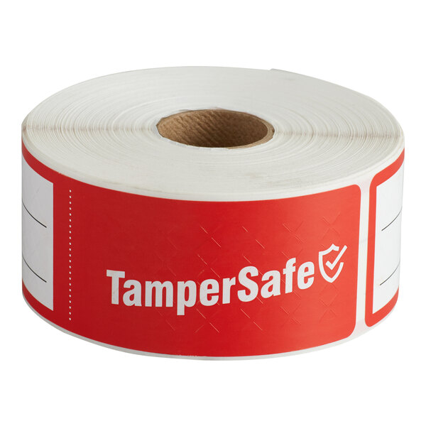 A roll of red TamperSafe labels with white text.