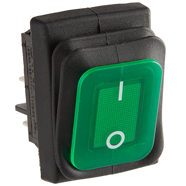 An Avantco green power switch with a white circle on the side.