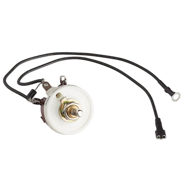 A small white circular speed control diode with black and white wire harnesses.