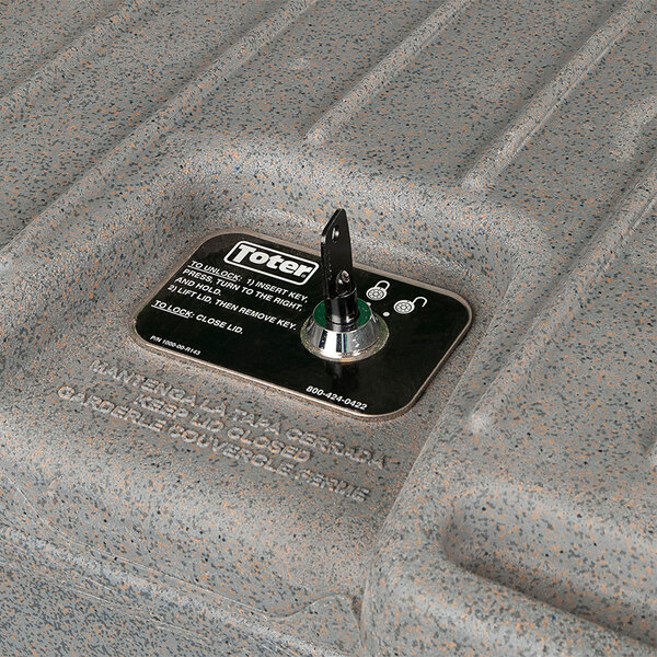 A close up of a Toter gray rectangular wheeled secure document management cart with barrel lock lid.