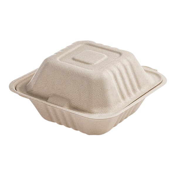 A close-up of a Fineline bagasse take-out container with a lid.