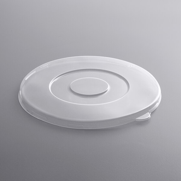 A white plastic Fineline lid with a circular design.