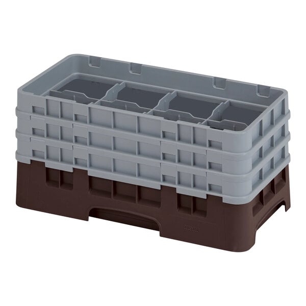 A brown plastic Cambro glass rack with 8 compartments and 3 grey extenders.