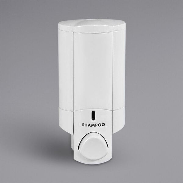A white plastic Dispenser Amenities Aviva shower dispenser with a black button.