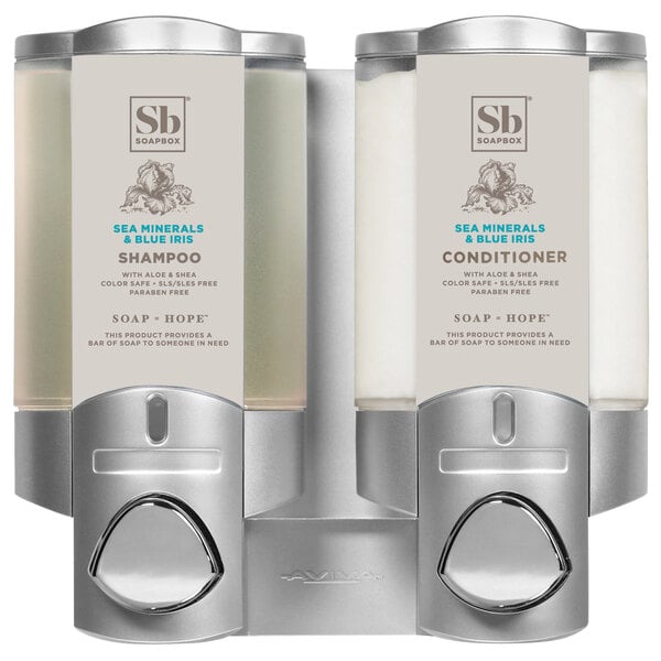 A silver Dispenser Amenities Aviva 2-chamber wall mounted soap dispenser.