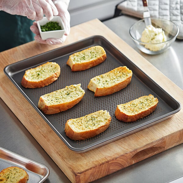 a person putting food on a tray