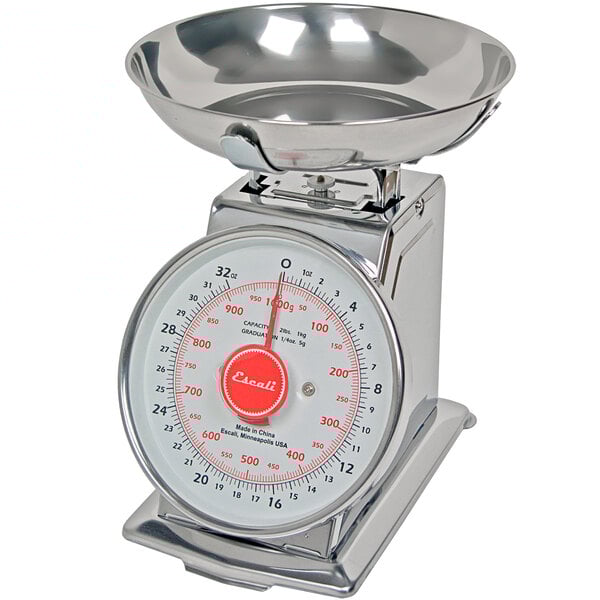 A silver San Jamar kitchen scale with a bowl.