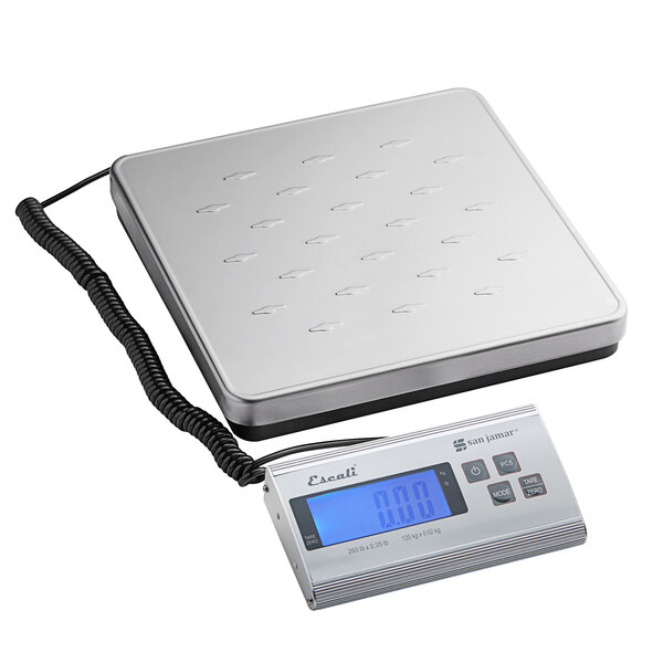 A silver rectangular San Jamar digital scale with a cord.