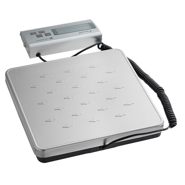 A silver San Jamar digital receiving scale with a black cord attached to a rectangular display.