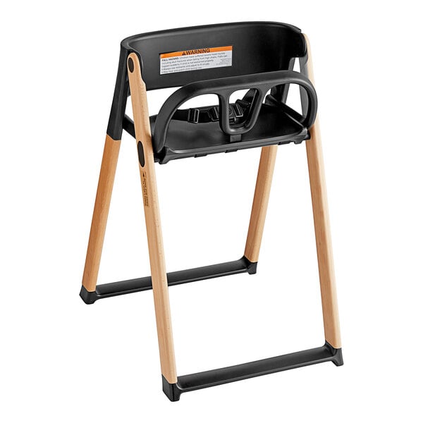 A Koala Kare black and natural wood high chair with a seat.