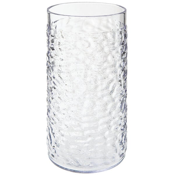 A close-up of a clear plastic Waikiki tumbler with a textured surface.